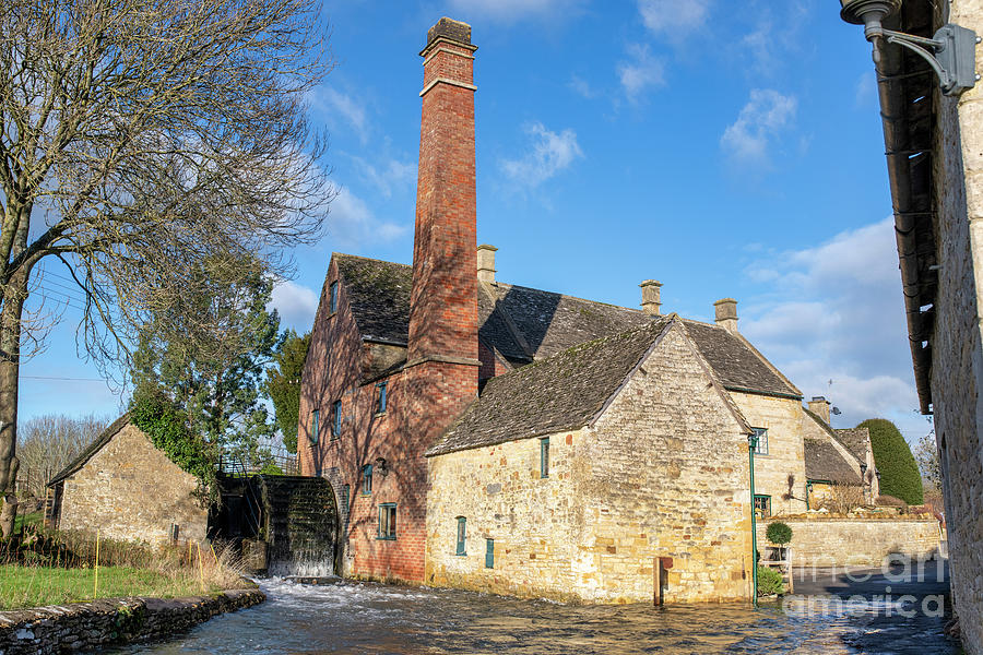 The Old Mill Lower Slaughter in the December Floods Photograph by Tim Gainey