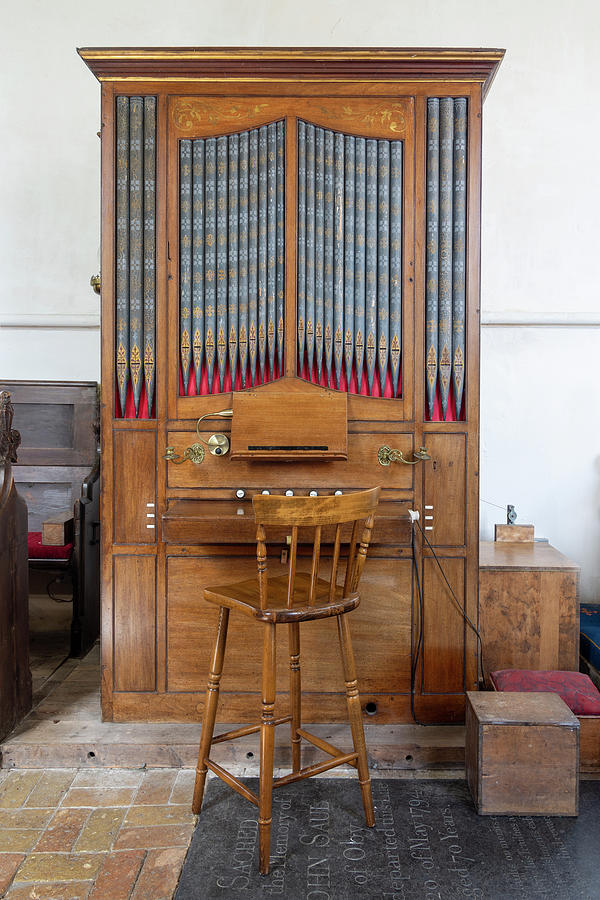 The organist will entertain Photograph by Steev Stamford