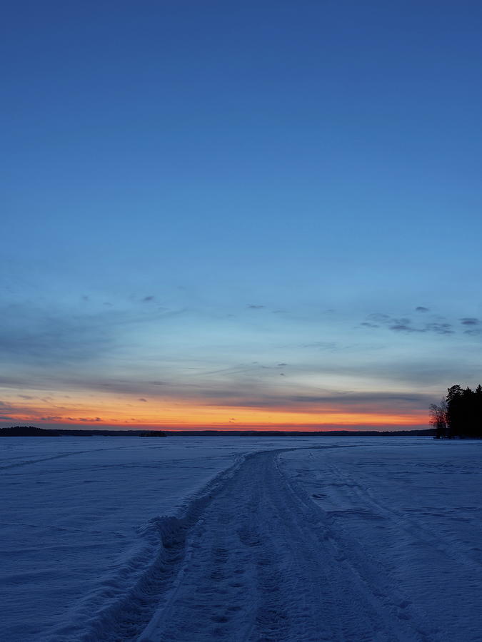 The paths on the lake Photograph by Jouko Lehto