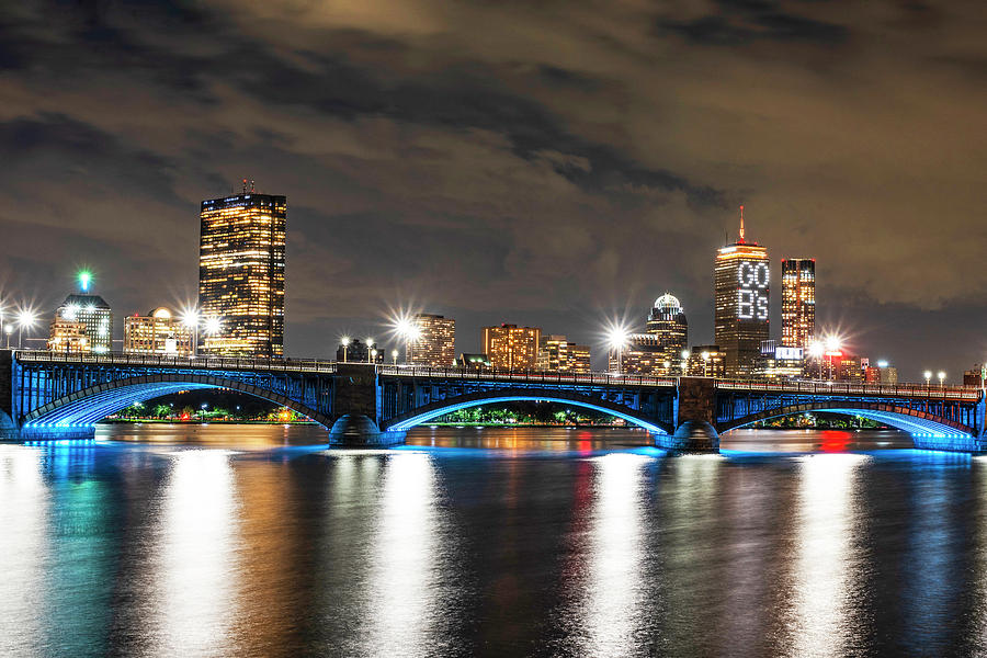 The Pru lit up for the Boston Bruins Boston MA Charles River Longfellow Bridge Skyline Photograph by Toby McGuire