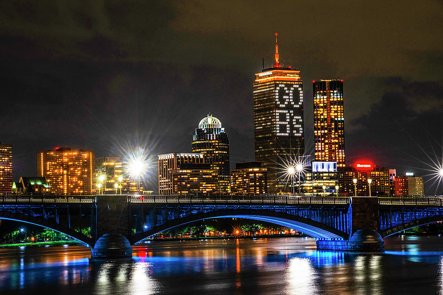 The Pru lit up for the Boston Bruins Boston MA Charles River Longfellow Bridge Photograph by Toby McGuire