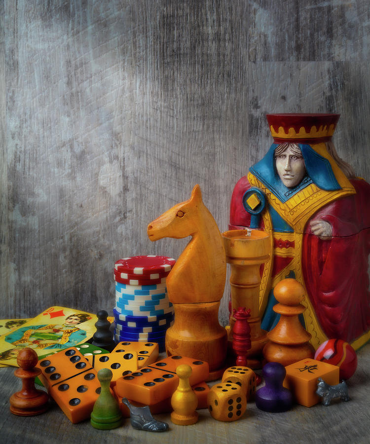 The Queen And Knight With Game Pieces Color Photograph by Garry Gay