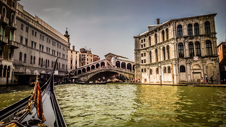 The Rialto bridge in Venice seen from a Gondola Photograph by Jakob Montrasio