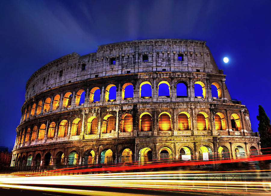 The Roman Colosseum at Night Photograph by Ali Nasser