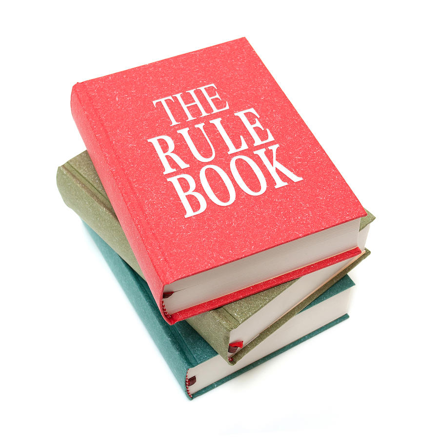 The Rule Books isolated on white background Photograph by Hudiemm