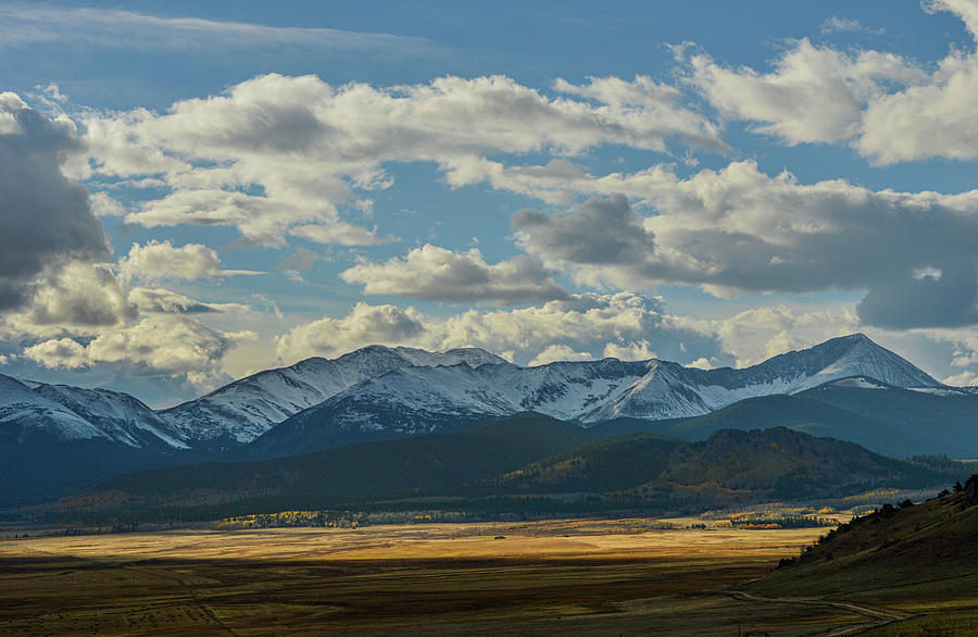 The Sangre De Cristos Mountains reflecting a fall landscape with Blanca ...