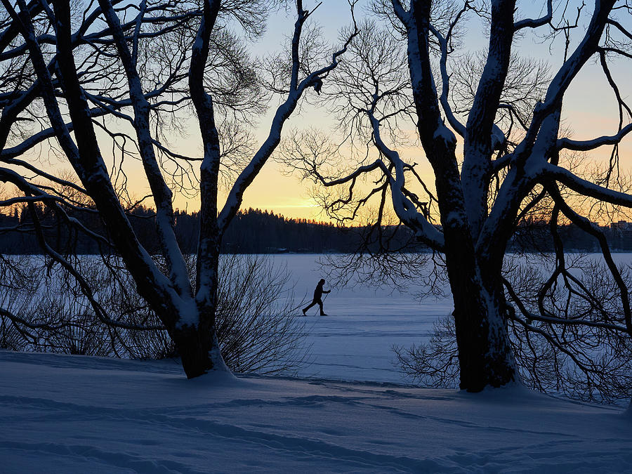 The skier on the ice Photograph by Jouko Lehto