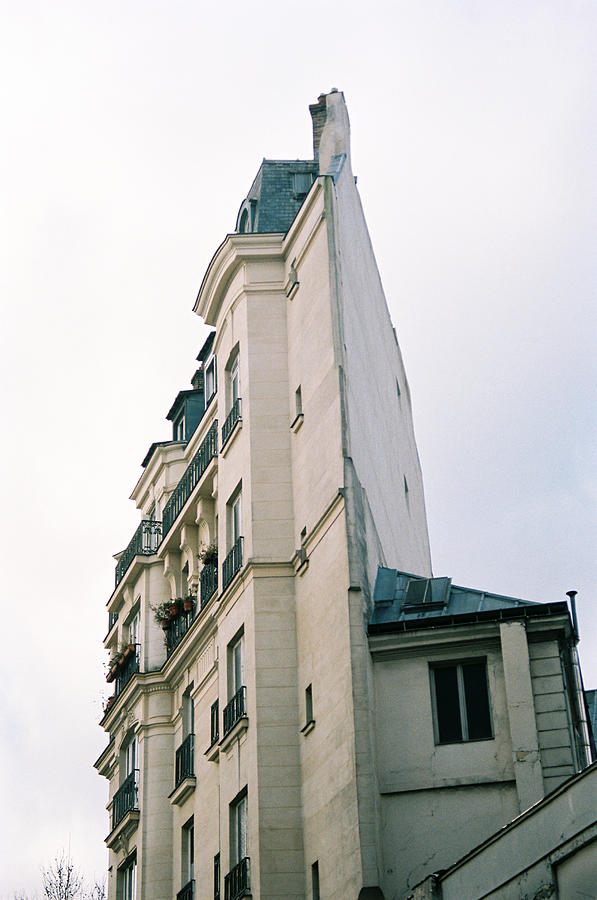 The slanted building Photograph by Barthelemy De Mazenod