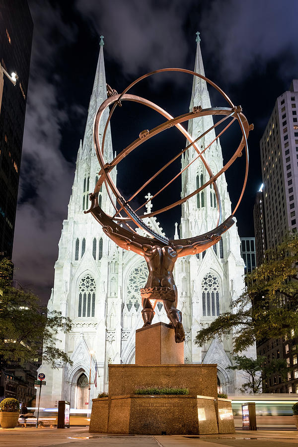 The Statue of Atlas and St Patricks Cathedral in New York at nigh Photograph by Karel Miragaya