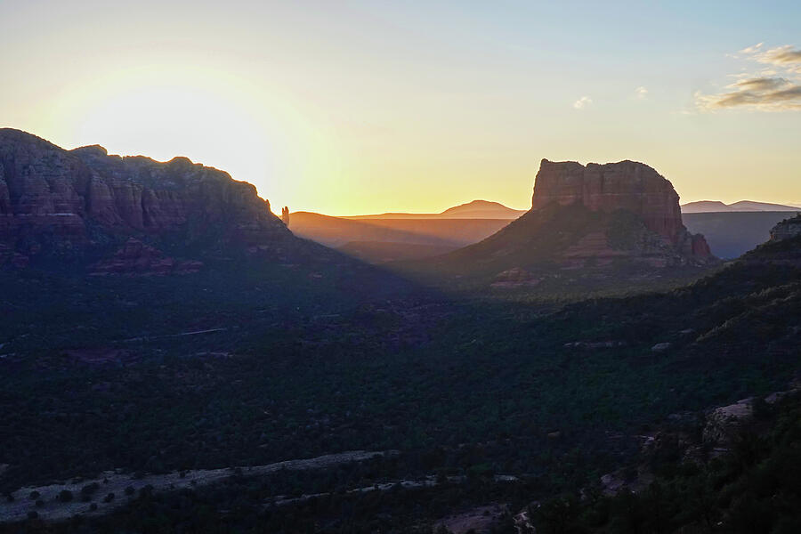 The Sun Rises over Sedona AZ as seen from Cathedral Rock Photograph by Toby McGuire