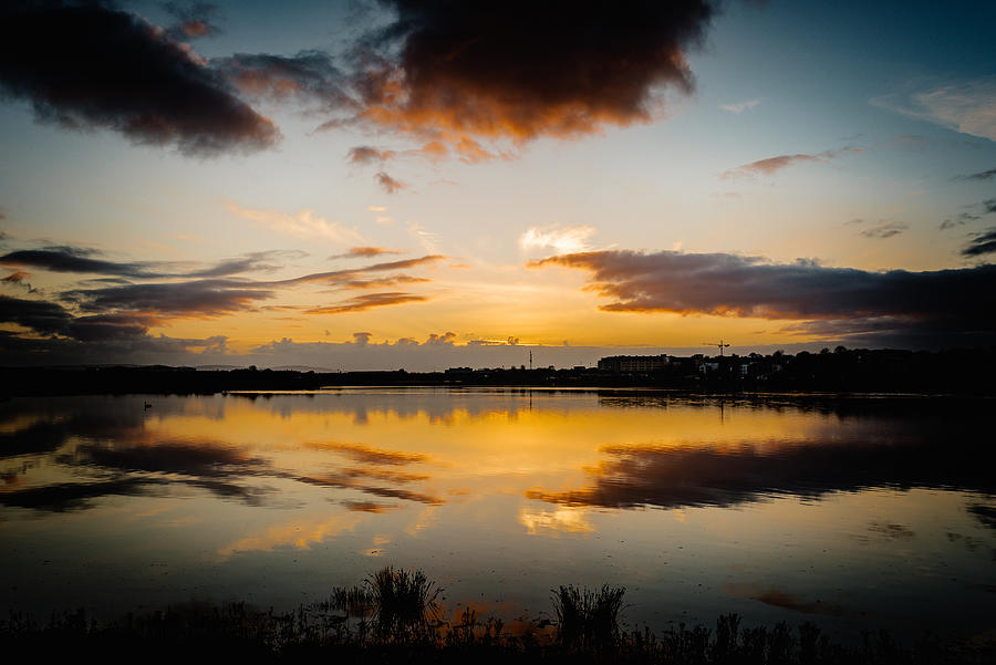 The Sun sets on Lough Atalia Photograph by Jason Fallon