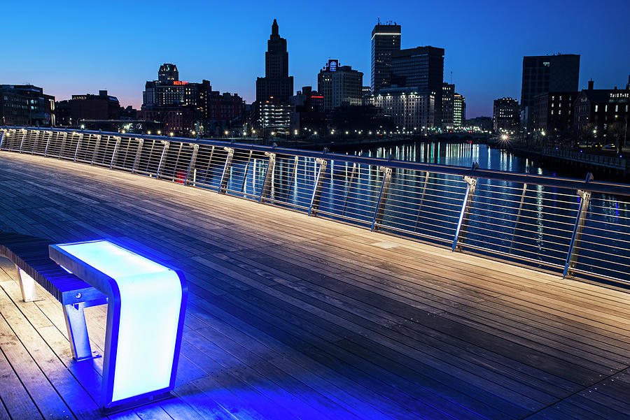 The sun sets on Providence Rhode Island from the PVD Pedestrian Bridge Lighted Bench Photograph by Toby McGuire