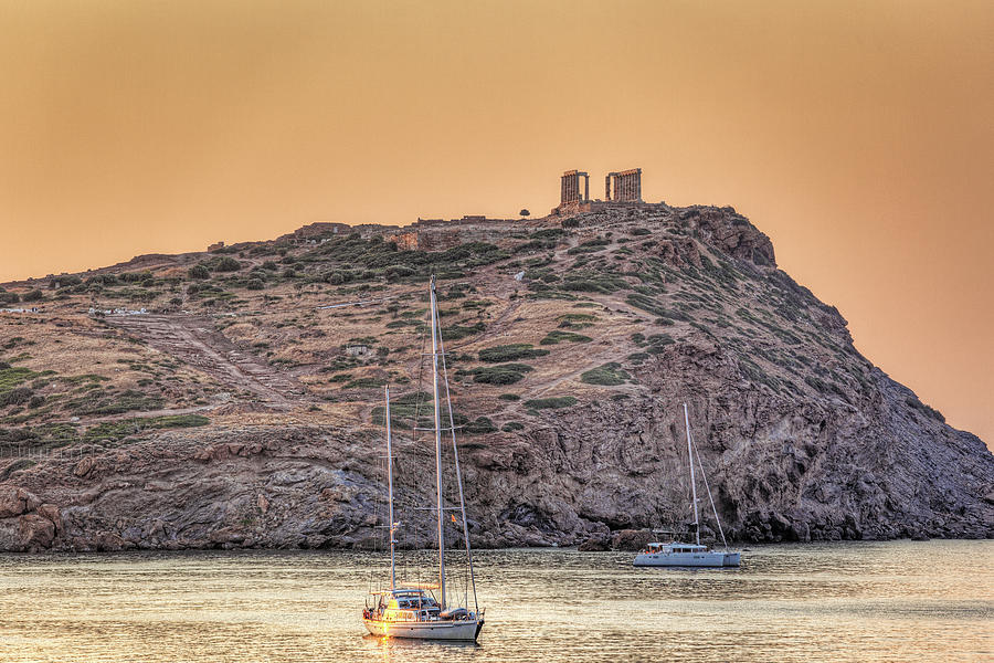 The sunrise at the temple of Poseidon in Sounio, Greece Photograph by Constantinos Iliopoulos