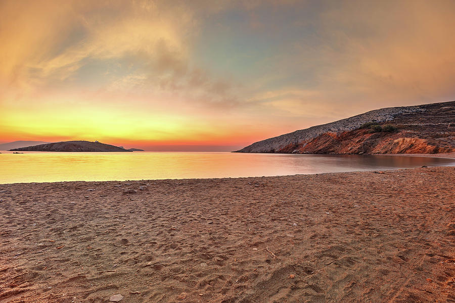 The sunrise in Livadi beach of Folegandros island, Greece Photograph by Constantinos Iliopoulos