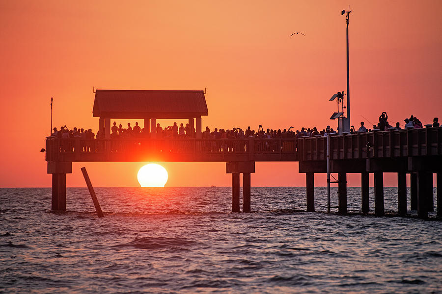The Sunset Draws a Crowd at the Clearwater Beach Pier Clearwater Florida Photograph by Toby McGuire