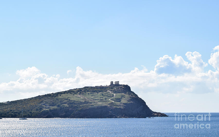 The Temple of Poseidon sits on a hilltop on Cape Sounion, Attica Photograph by William Kuta