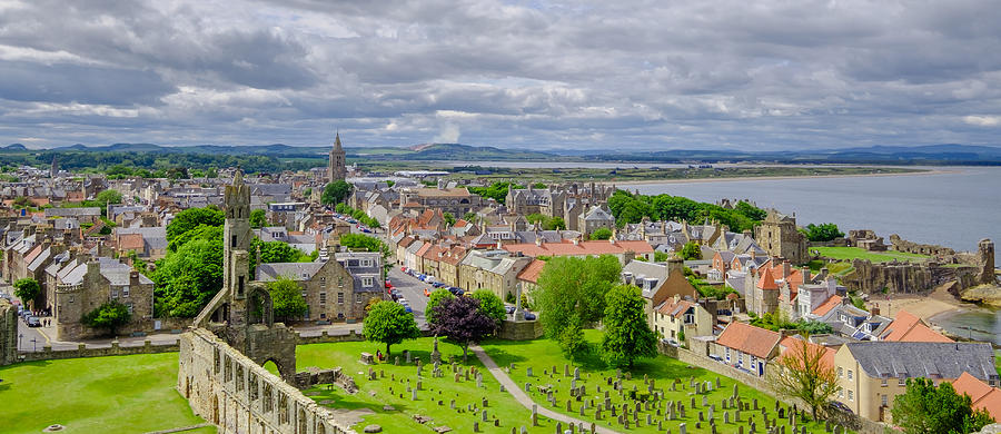 The town of St Andrews seen from the St Rules tower. You can see the ruins of the Cathedral, built in 1158, and the ruins of the Castle, dating to the 1200s. St Andrews, Fife, Scotland. Photograph by Flavio Vallenari