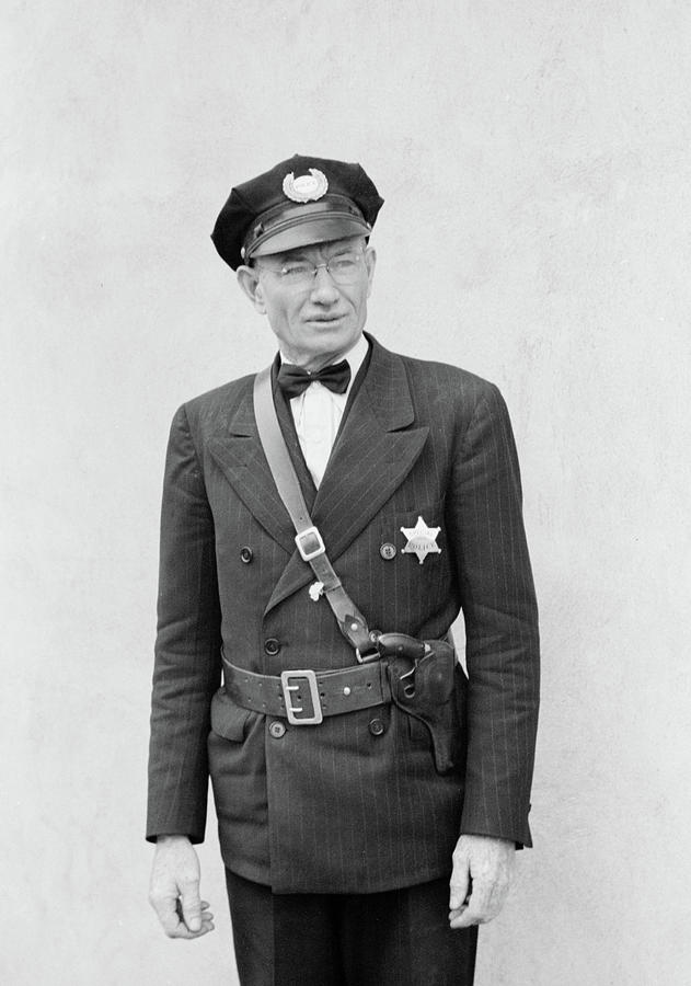 Black And White Photograph - The Town Policeman - Litchfield, Minnesota 1939 by John Vachon