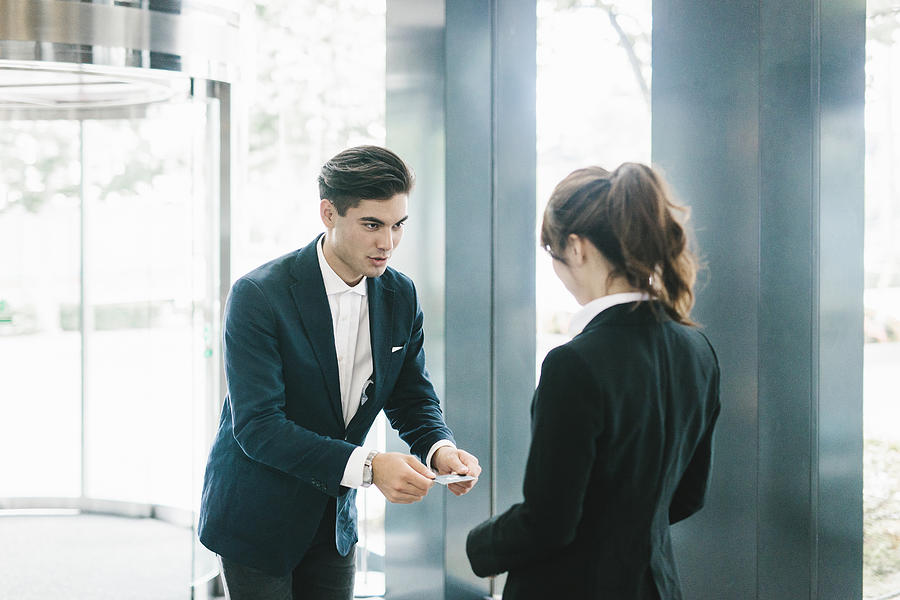 The Traditional Exchanging of a Business Card Photograph by Visualspace