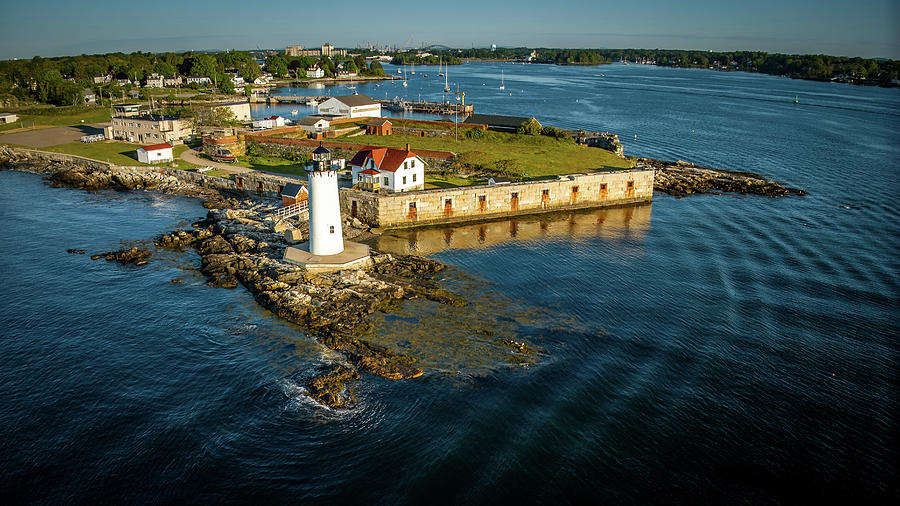 The Tranquil Majesty of Portsmouth Lighthouse Photograph by Jeff Folger