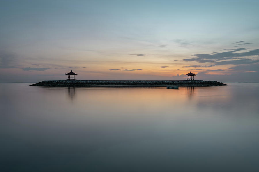The two gazebos just off the beach in the ocean at Karang beach, Sanur, Bali Photograph by Anges Van der Logt