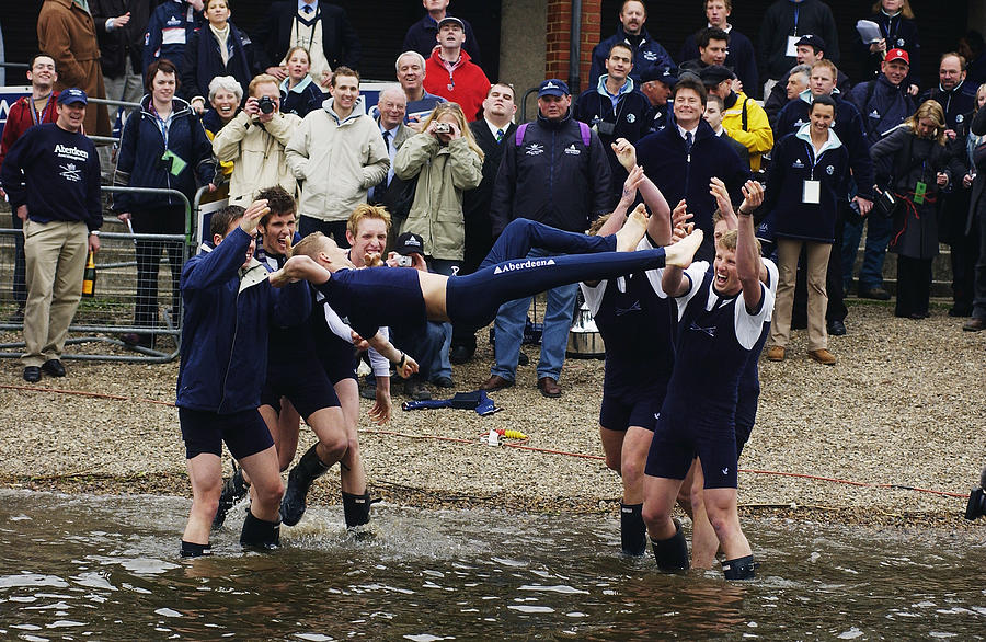 The victorious Oxford Cox Acer Nethercott is thrown in the Thames in traditional manner Photograph by Tom Shaw
