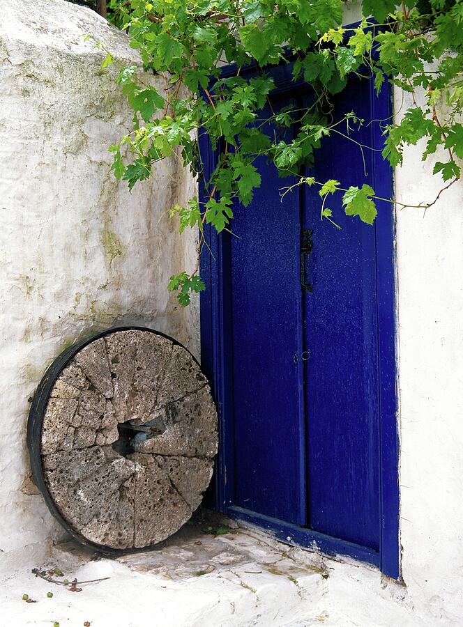 The wheel and the arbor Photograph by Kostas Petrakos