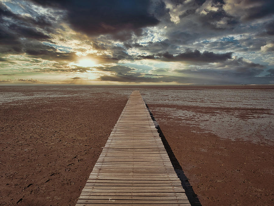 The wooden bridge that extends into the sea as a viewing point d