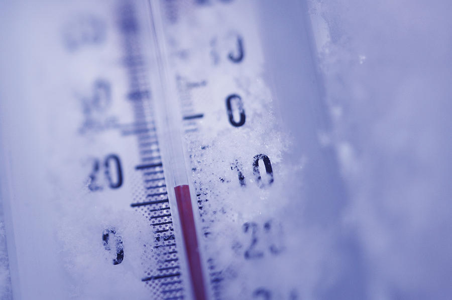 Thermometer in snow Photograph by Comstock