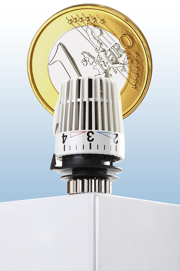 Thermostat on heating and Euro coin Photograph by Creativ Studio Heinemann