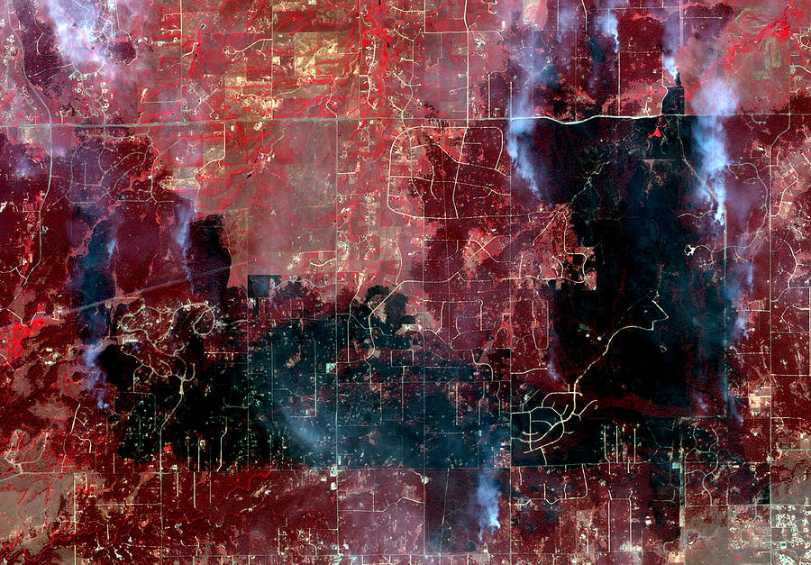 This is an infrared satellite image overview of the Black Forest fires near Colorado SPrings, Colorado collected on June 13, 2013. Photograph by DigitalGlobe/ScapeWare3d