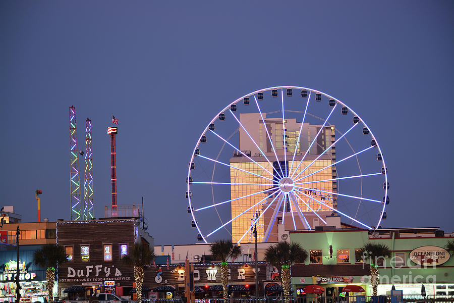 This Is The Skyline Of Myrtle Beach With The Myrtle Beach Skywheel. It Is On The Boardwalk Along The Photograph