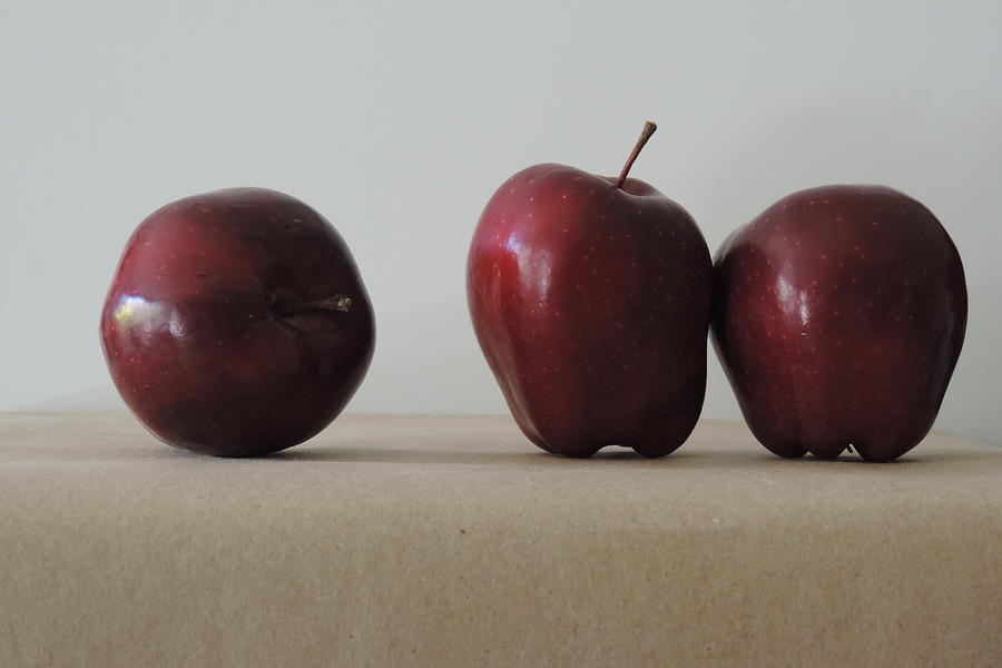 Three apples Photograph by Bill Tomsa