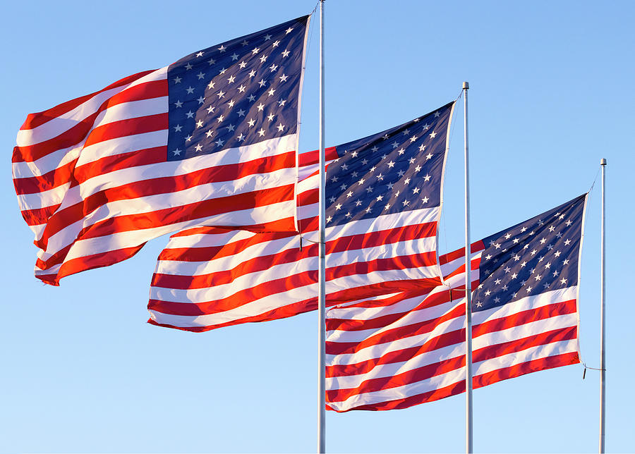 Three big American flags rippling in high winds Photograph by James ...