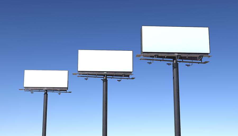 Three billboards isolated against blue sky Photograph by ZargonDesign