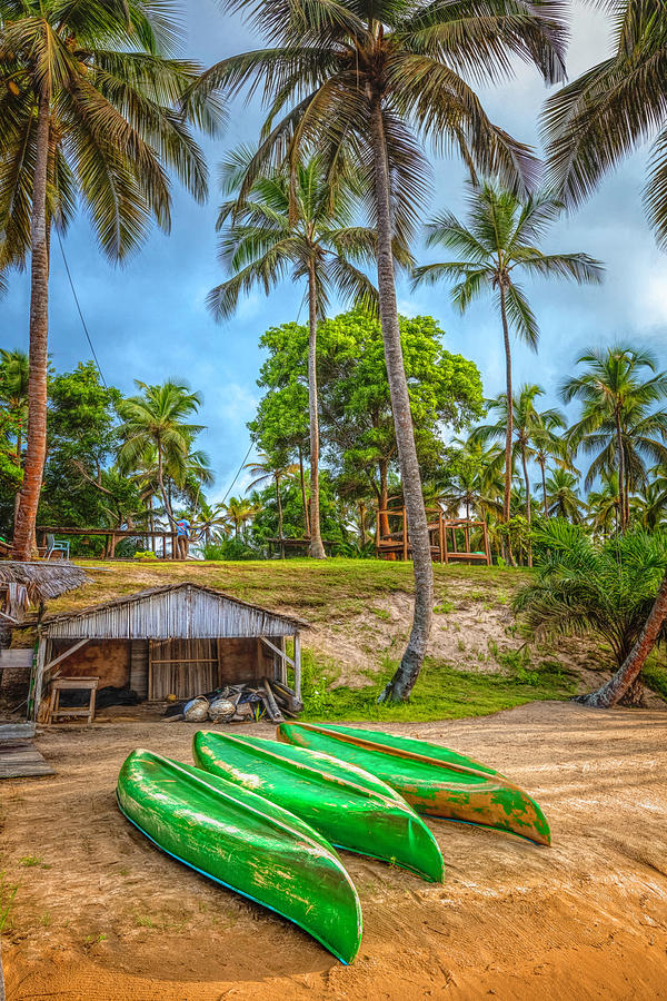 Three Canoes on the Beach Photograph by Debra and Dave Vanderlaan