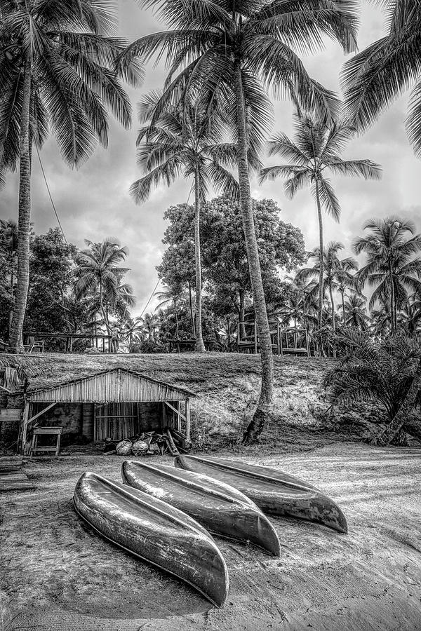 Three Canoes on the Beach in Black and White  Photograph by Debra and Dave Vanderlaan