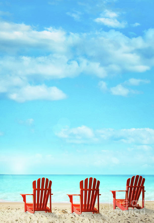 Three deck chairs near the ocean Photograph by Sandra Cunningham