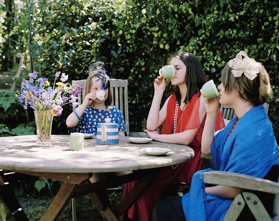Three Girls Drinking Tea Photograph by Alys Tomlinson