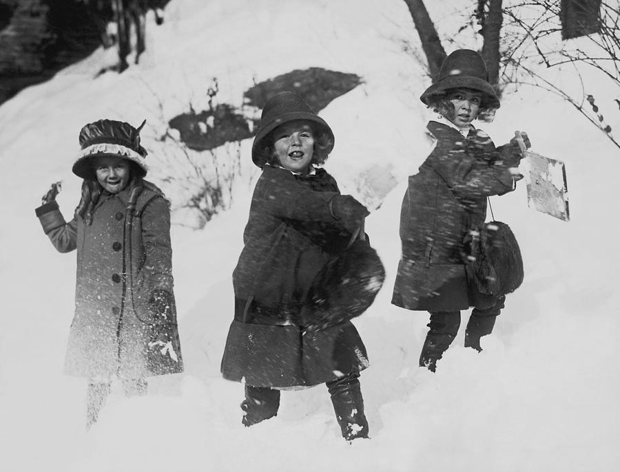 Three Girls In Winter Coats, Playing In The Snow Photograph by Fpg
