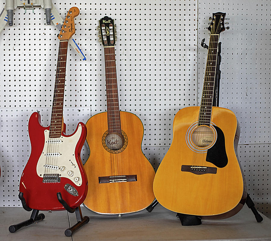 Three Guitars Photograph by Dart Humeston