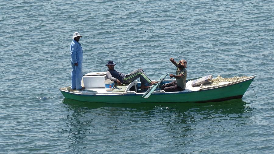 Three Men In A Boat Photograph by Ocean View Photography - Pixels