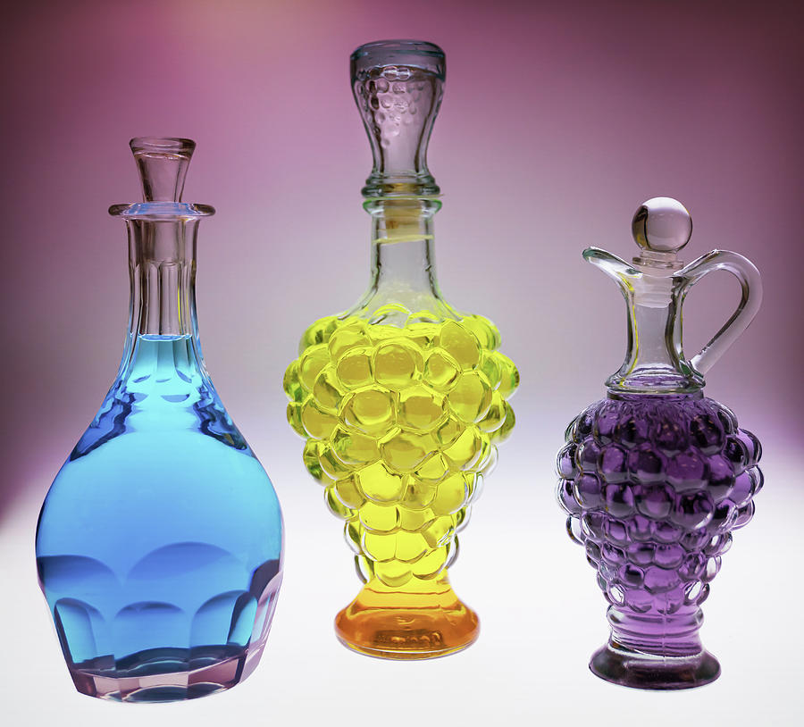 Three Perfume Bottles Photograph by Sylvia Goldkranz