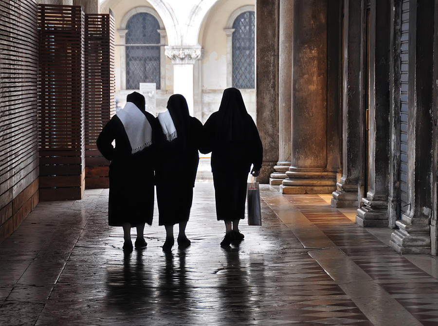 Three religious sisters walking in Venice Photograph by PaoloBis