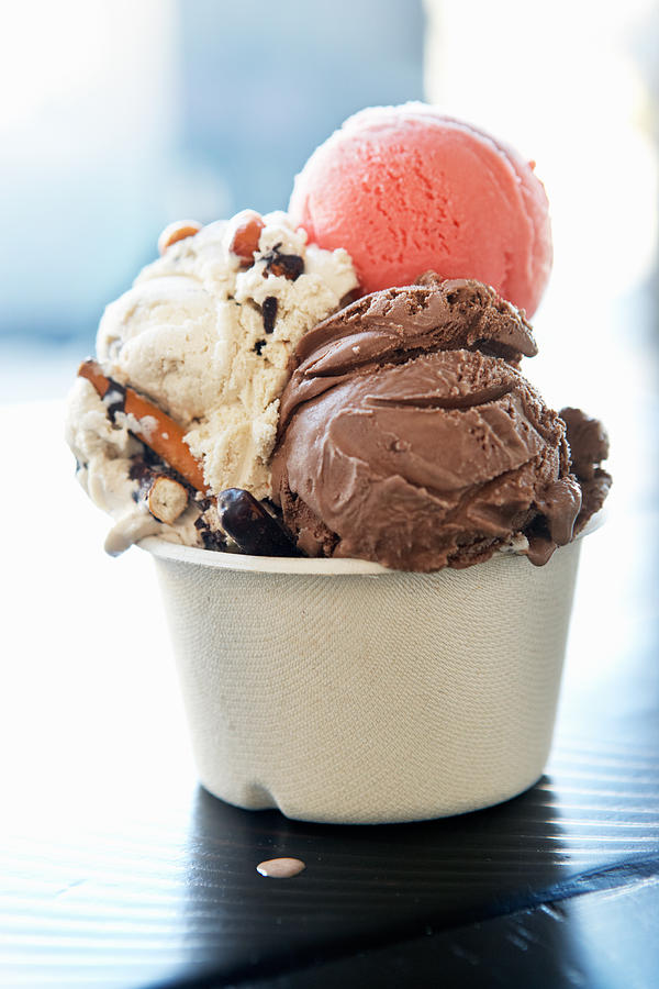 Three scoops of ice cream in a paper cup Photograph by Maren Caruso Three scoops of ice cream in a paper cup Photograph by Maren Caruso