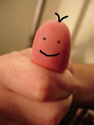 Thumb Face Photograph by Andrew Lawrence