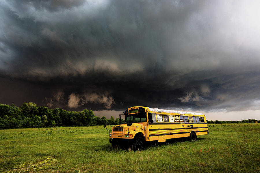 Nature Photograph - Thunder Bus - Storm Advancing Over Old School Bus in Oklahoma by Southern Plains Photography