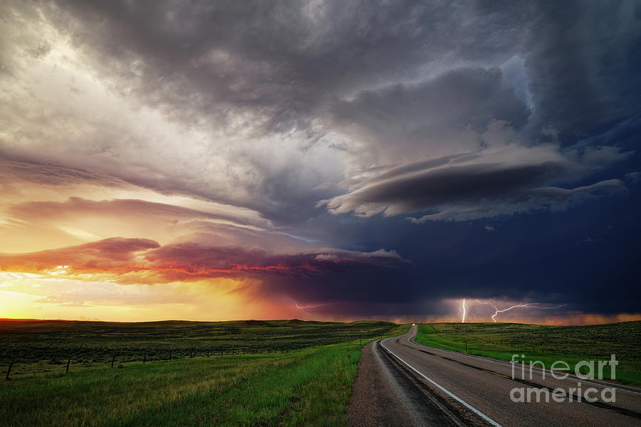 Thunderstorm with Ominous Clouds and Lightning at Sunset in Wyoming Photograph by Tom Schwabel