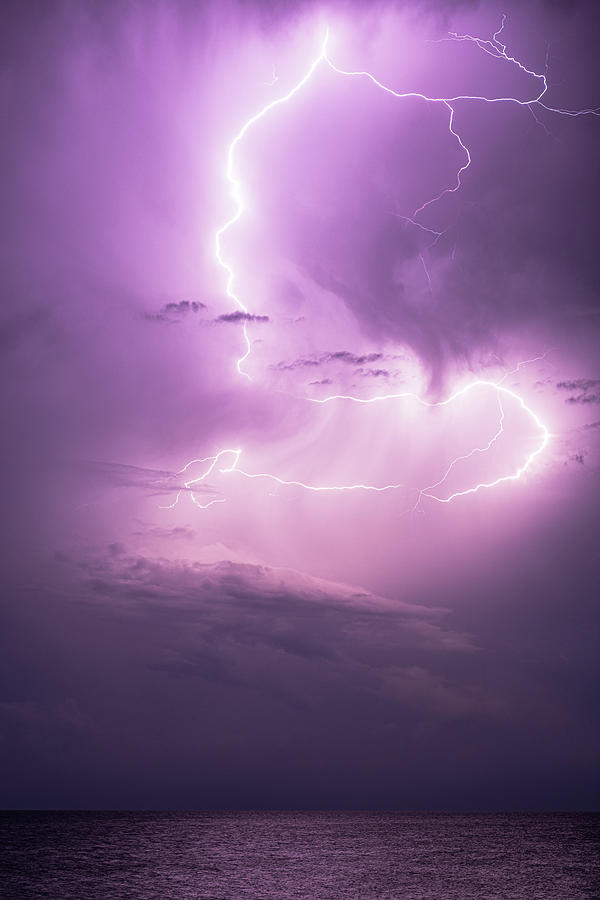 Thunderstorm over the sea at night - 2 Photograph by Mirko Chessari