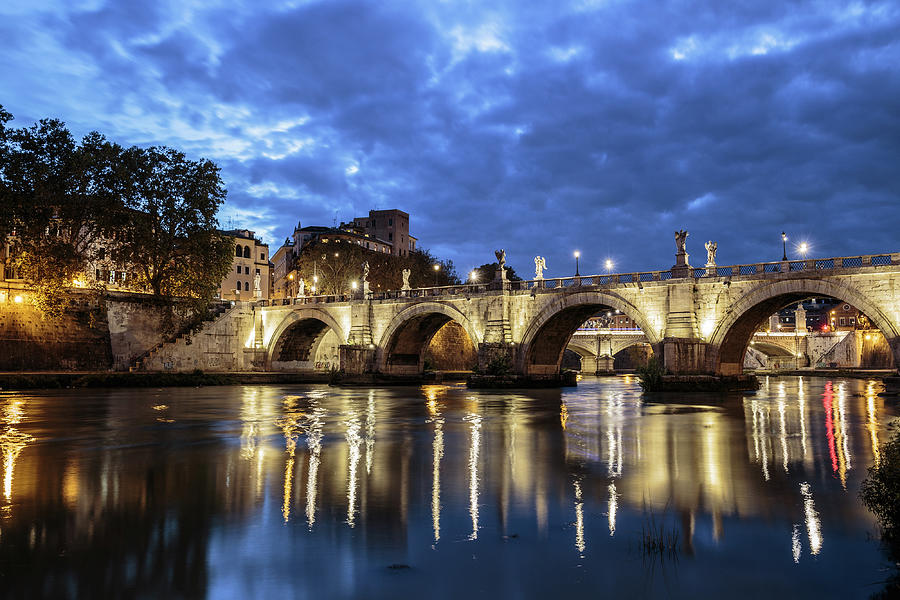Tiber River at sunset in Rome, Italy Photograph by Fabiano Di Paolo